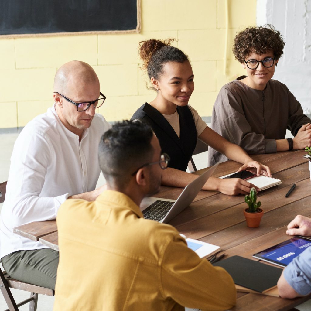 Group of Workers at Desk